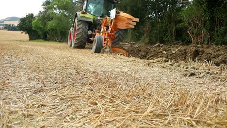 daily farming duties tractor ploughing trenched fields for seeding at ancona italy