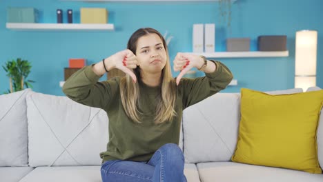 Bored-teenage-girl-expressing-negative-energy-at-camera.