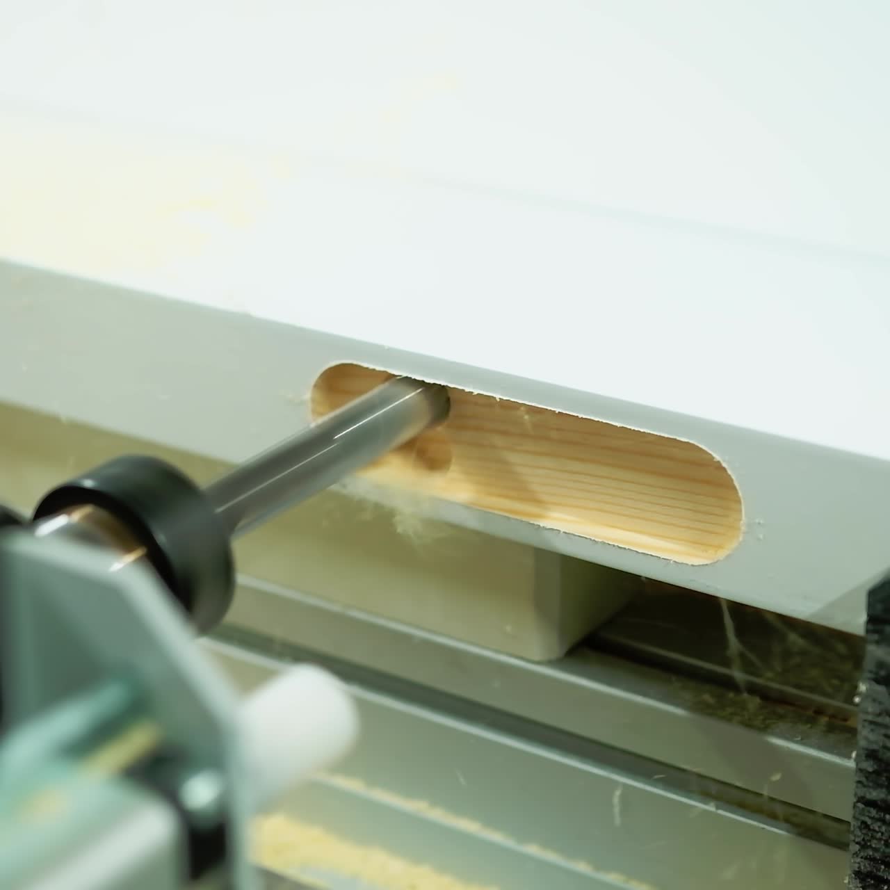 Factory for doors production. Modern machine device making wooden doors in workshop. Manufacturing furniture. Close-up.