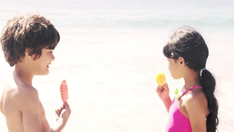 cute siblings eating ice creams