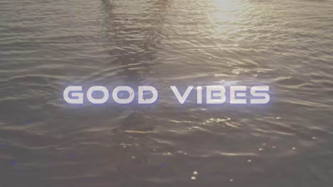 Animation-Der-Worte-„Good-Vibes“-In-Weißen-Buchstaben-über-Ruhig-Fließendem-Wasser