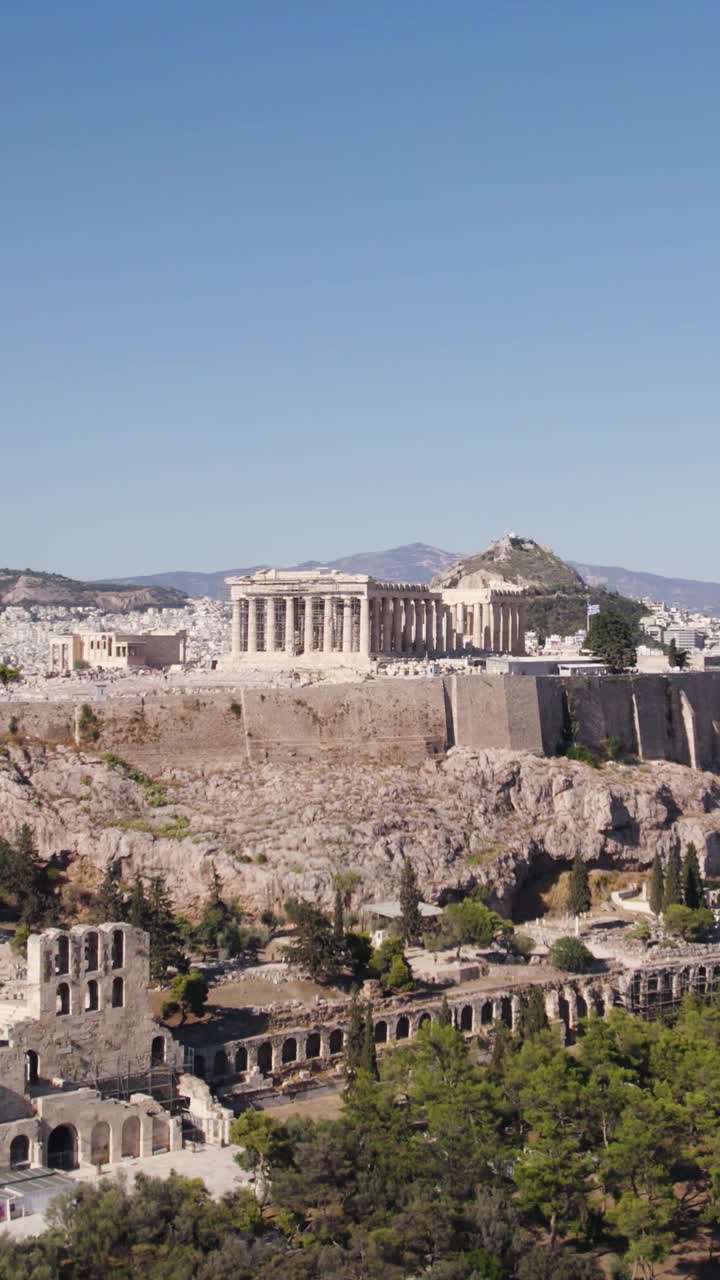 Vertical drone approaching Athens’ Acropolis, highlighting the ancient and iconic hilltop landmark