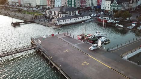 aerial view of pontoon, boats and buildings in ireland, atlantic ocean shore