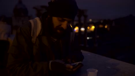 smiling homeless counting his money in the night- misery, joy, money