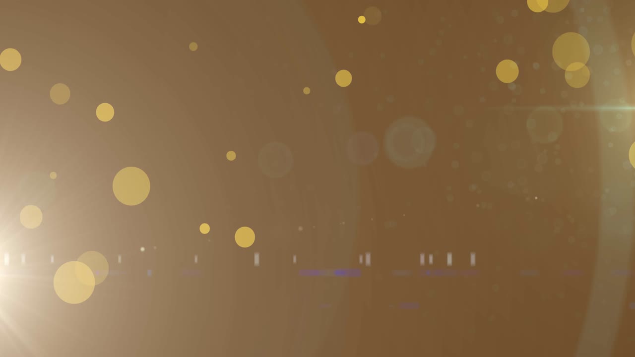 Animation of light spots and trails on black background