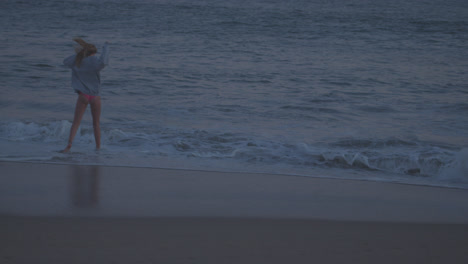 Girls-enter-the-Pacific-surf