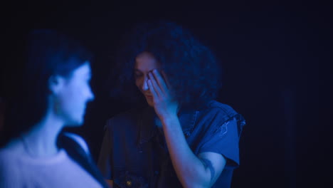 people laughing in a club