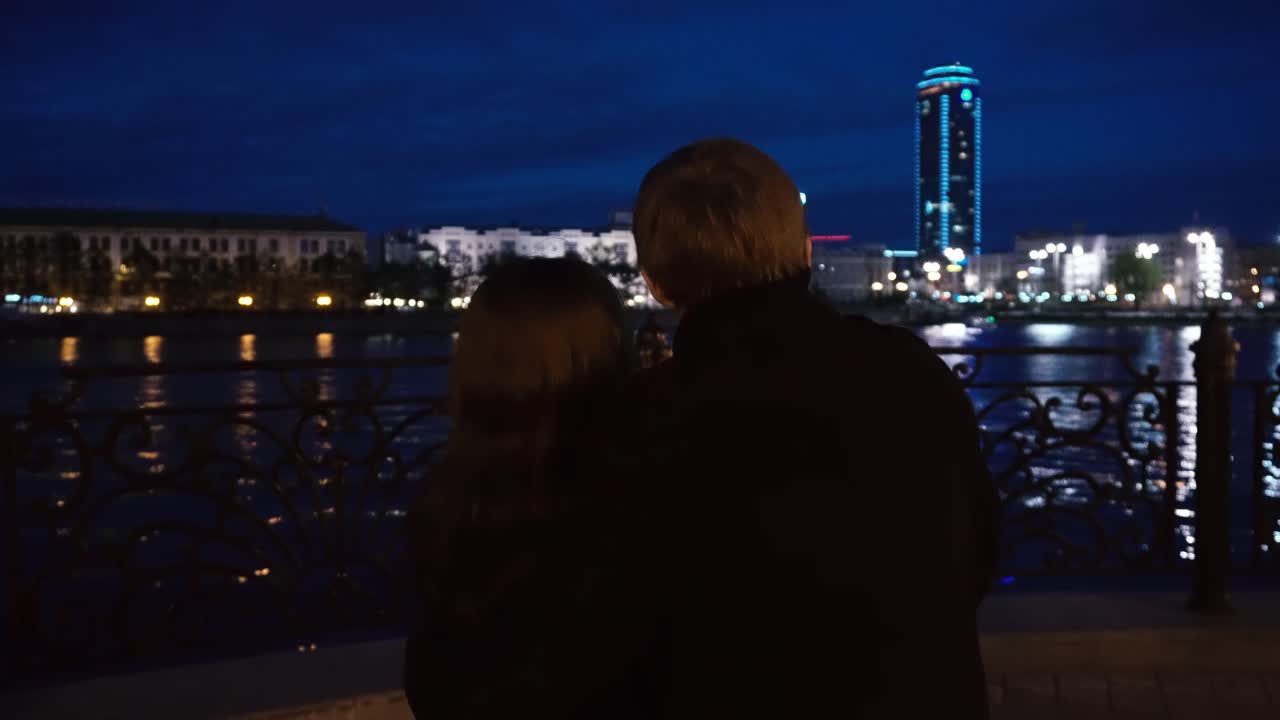 Couple at Night by the River