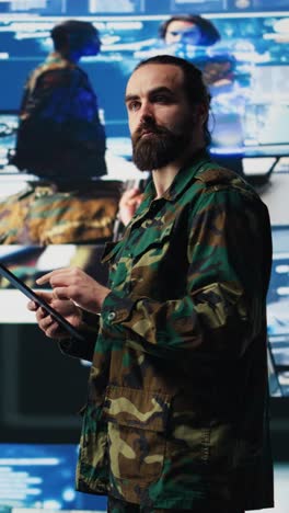 vertical video military officer engaged in tactical command and surveillance activity