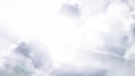 the point of view moves into the dark clouds with a thunderstorm striking