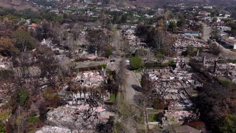 aerial view of extensive wildfire damage in a residential area