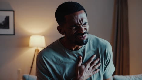 man experiencing chest pain