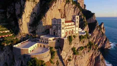 stunning aerial view of a church on a cliffside in capri, italy