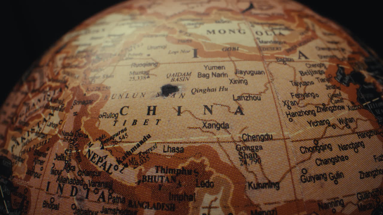 Close-up view of a vintage world globe focusing on the Asian continent