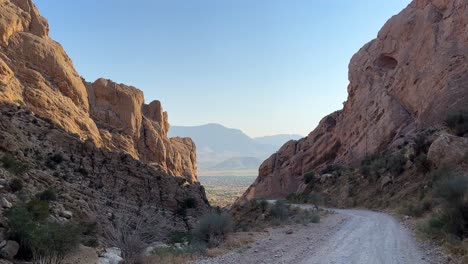 fig tree garden in background of the scenic beautiful natural canyon valley in estahban in iran nature landscape the wonderful off road trip adventure in a hiking couple travel in desert climate