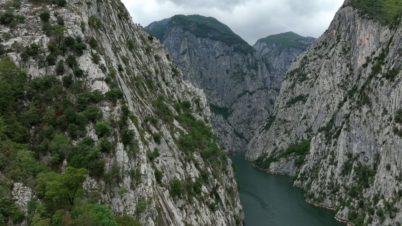 Steep mountains around Lake Komani in Albania.