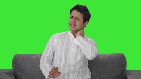 Sick-Indian-man-having-neck-pain-Green-screen