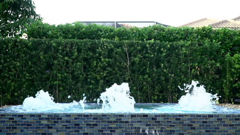 Blue-bubbles-rising-to-the-surface-of-the-hot-tub