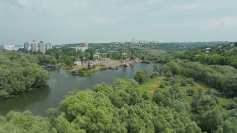 approaching-the-shipyard-through-the-dense-treetops-that-are-located-on-the-edge-of-the-settlement