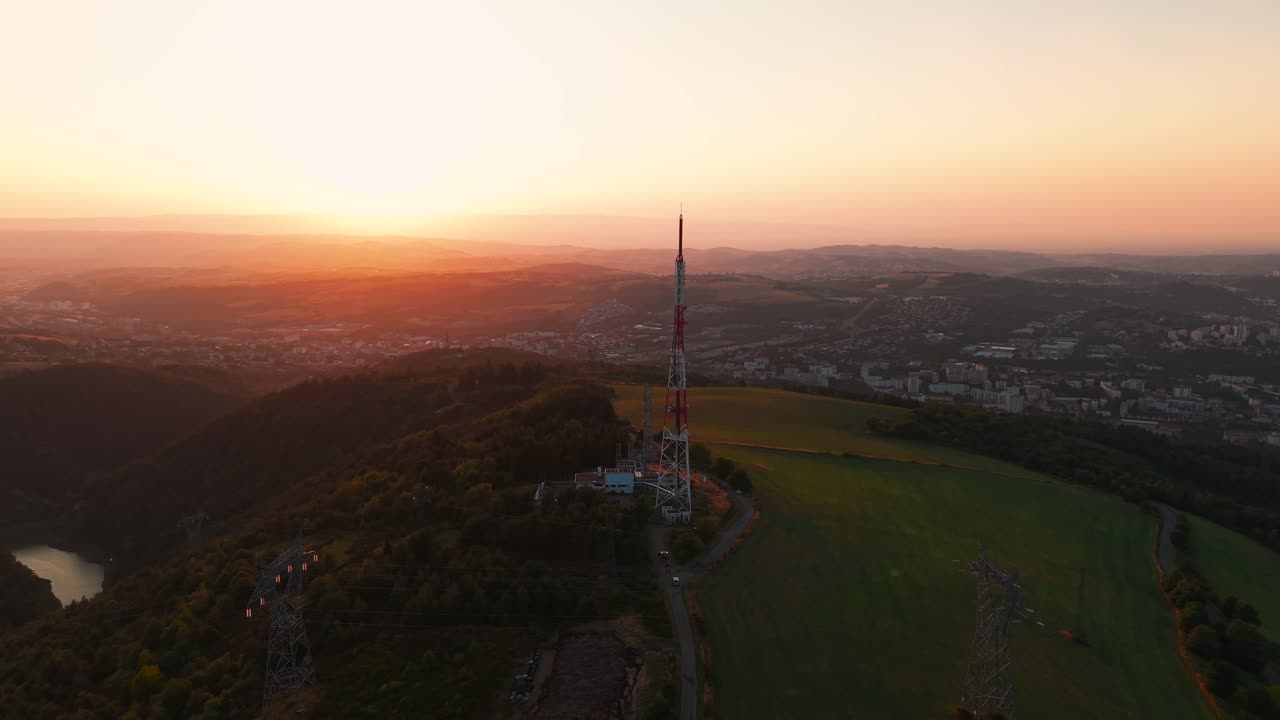 aerial shot at le Guizay viewpoint above Saint Etienne city at sunset during summer, loire departement, Auvergne Rhone Alpes region, France