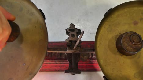 close view from above of a vintage weighing machine