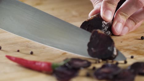 cutting smoked sausage