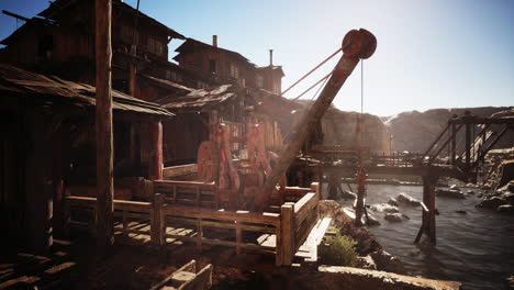 abandoned rusty crane in desert landscape