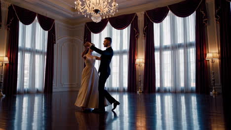couple dancing in a grand ballroom