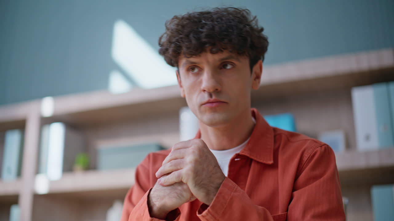 Furious director closing laptop feeling frustrated video call in office closeup