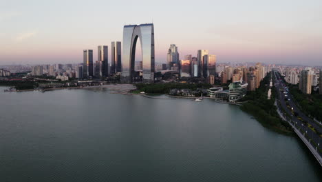 cbd buildings by the lake. aerial in suzhou, china.