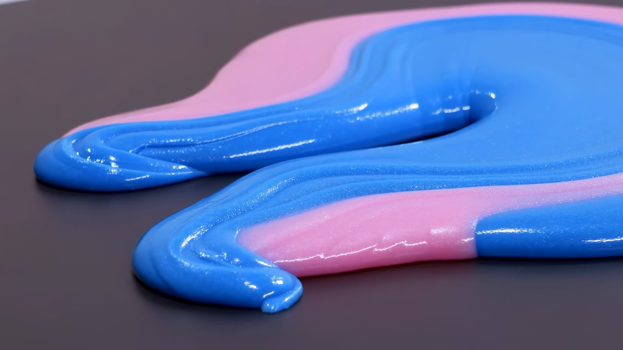 Blue Pink Paint Poured On Black Surface, Glossy Viscous Swirl Forming Smooth Drip, Macro Texture