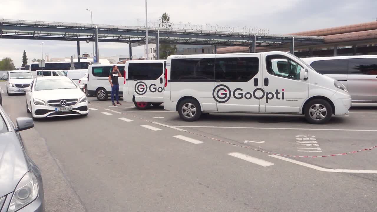Ljubljana International Airport. Taxi in front of airport terminal.