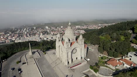 orbital view of santa luzia church sanctuary on hilltop of viana do castelo, portugal on cloudy day