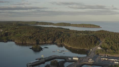 Pan-right-to-left-of-black's-harbour-bay-with-cars-unloading-from-ferry