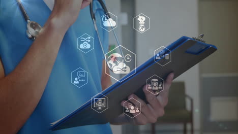 processing medical data, healthcare professional holding clipboard in hospital
