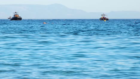 motorboats floating and sailing near shoreline of mediterranean sea, fun and leisure sport water activities on summer vacation