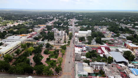 Aerial-orbital-shot-of-park-in-downtown-valladolid-Mexico