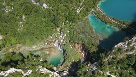 Top-view-of-the-beautiful-Plitvice-Lakes-National-Park-with-many-green-plants-and-beautiful-lakes-and-waterfalls