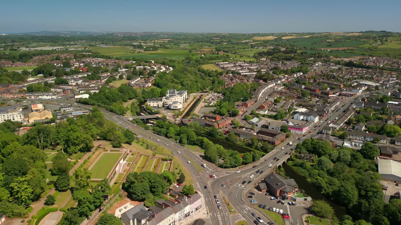 Ultra-wide, reversing aerial video of Lisburn, Northern Ireland, UK on a bright and sunny day. Filmed in 4K, 60FPS and with Rec709 Color.