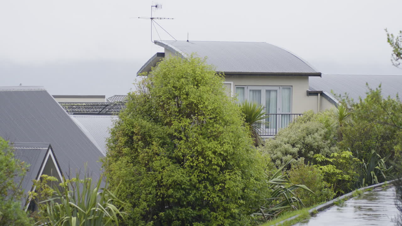 Rainy Weather On A Peaceful Residential Neighbourhood. Close-up Shot