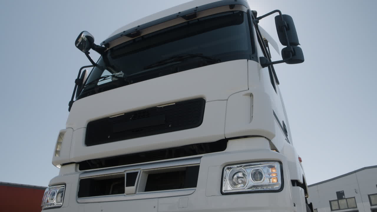 A close-up of a white semi-truck