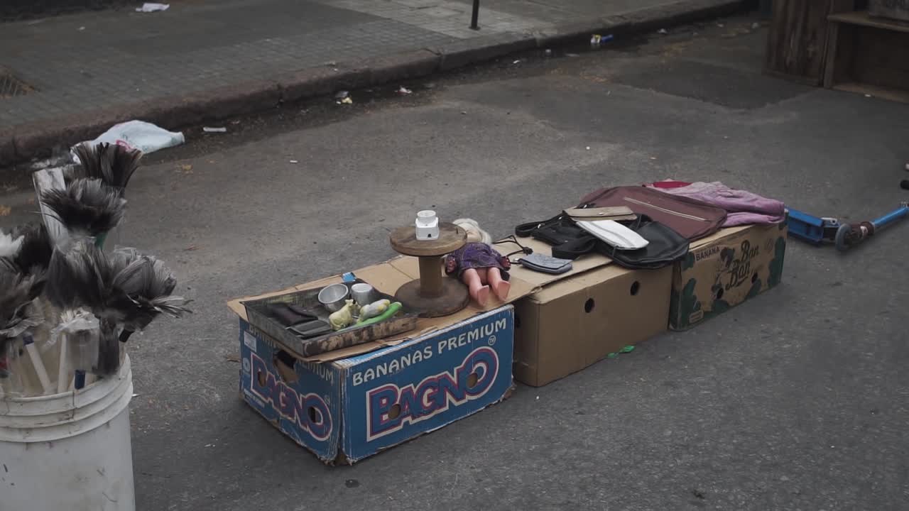 Static slomo shot of used old stuff at Feria Tristan Narvaja, Montevideo