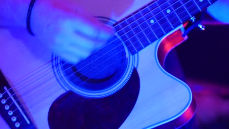 guitar acoustic player close-up