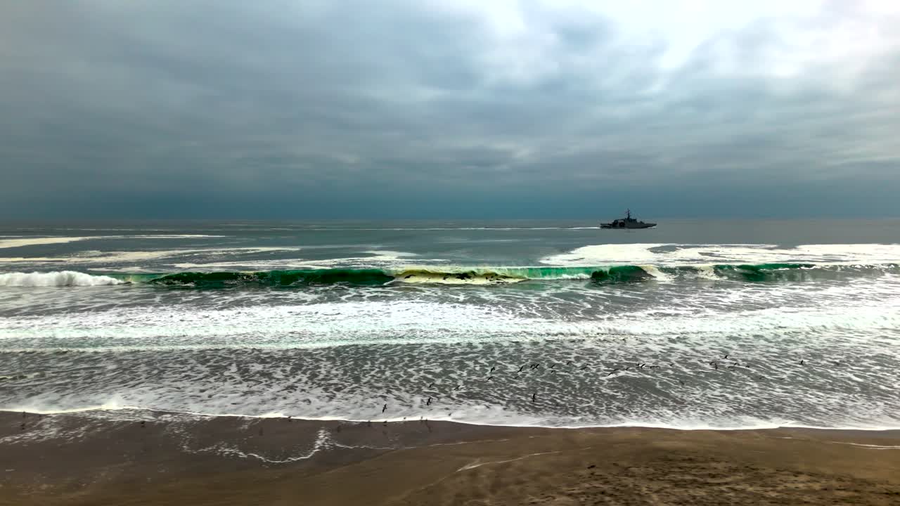 Huayquique beach Chile Iquique building ocean sea traffic tarapaca mountain ocean sea foam boat ship drone travelling beach