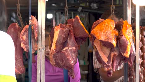 food market in phnom penh in the evening, meat on display