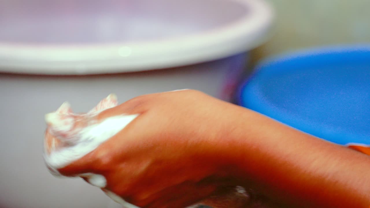Washing Hands with Soap: A Close-Up View of Hygiene Practices