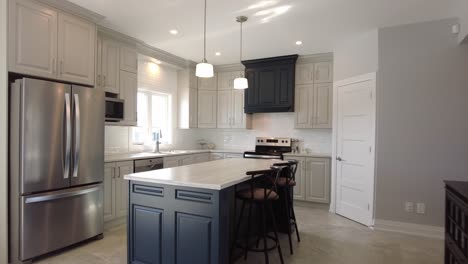 high-end-kitchen-pov-gimbal-walk-closer-to-look-in-depth-real-estate