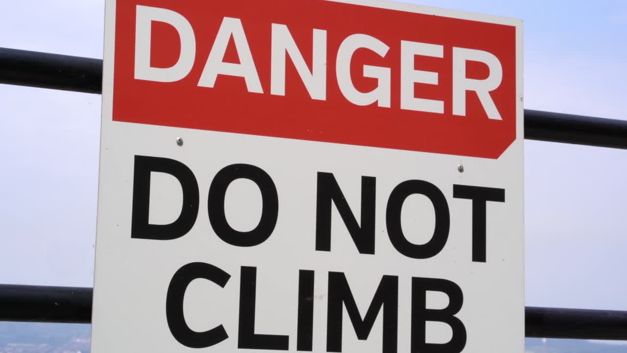 Danger sign red and white do not climb