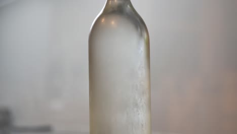 Glass-water-bottle-with-mist-tilt