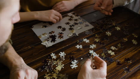 people doing a puzzle